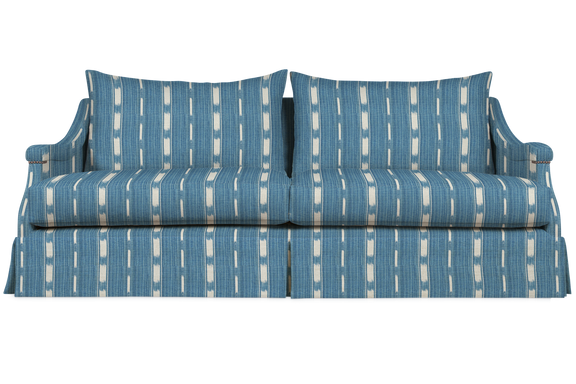 Blue and store white striped sofa